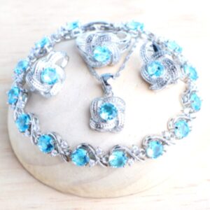 Hetty'S - Schitterende sieraden set - zilverplated -  in 3 Kleuren - Blauwe - Roze - Groene en witte Zirconia's - Armband - Oorbellen - Hanger + collier - Ring