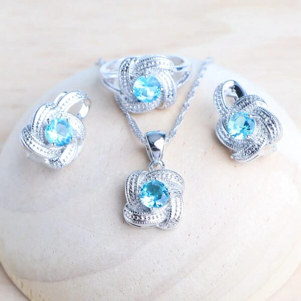 Hetty'S - Schitterende sieraden set - zilverplated -  in 3 Kleuren - Blauwe - Roze - Groene en witte Zirconia's - Armband - Oorbellen - Hanger + collier - Ring - Afbeelding 9